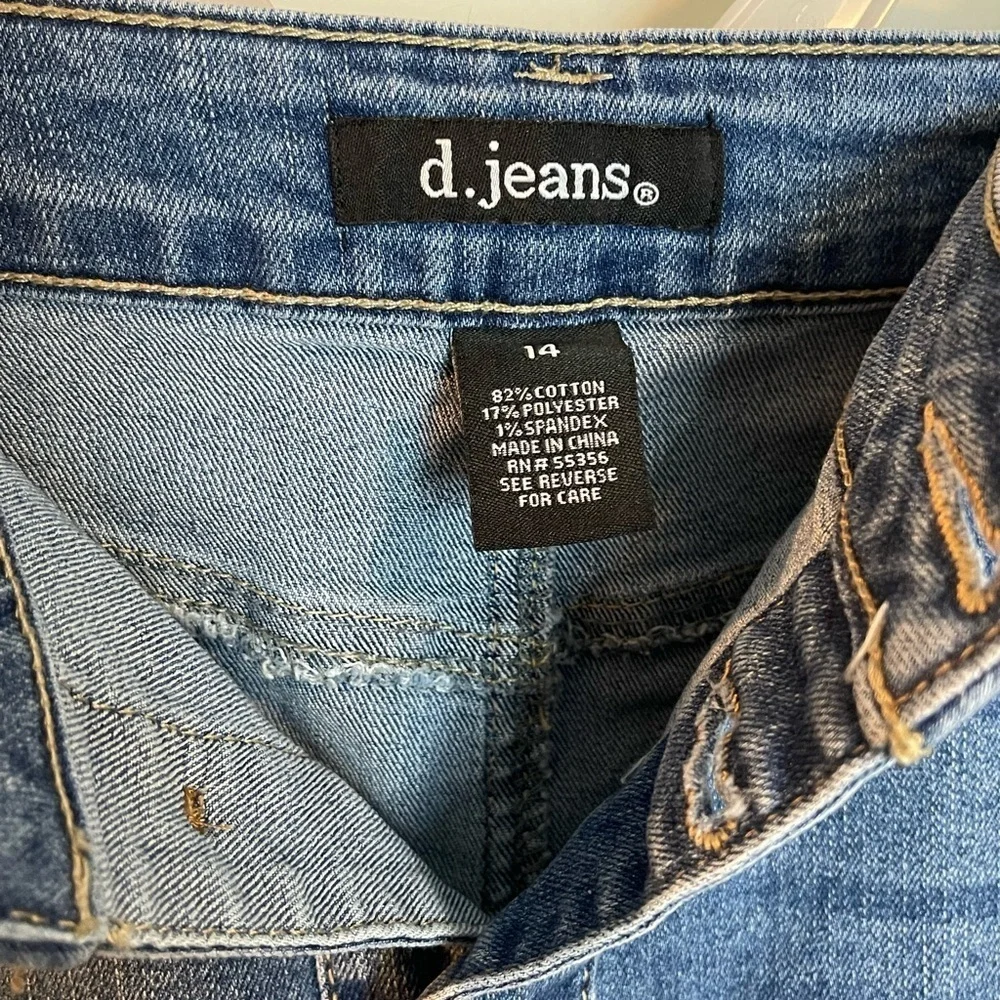 D. Jeans women’s size 14 button front high waisted jeans skirt